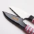 turkusowy-obcinacz-do-nitek-cohana.webp